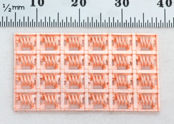An array of pure copper inductors 3D printed with Holo's PureForm metal AM process